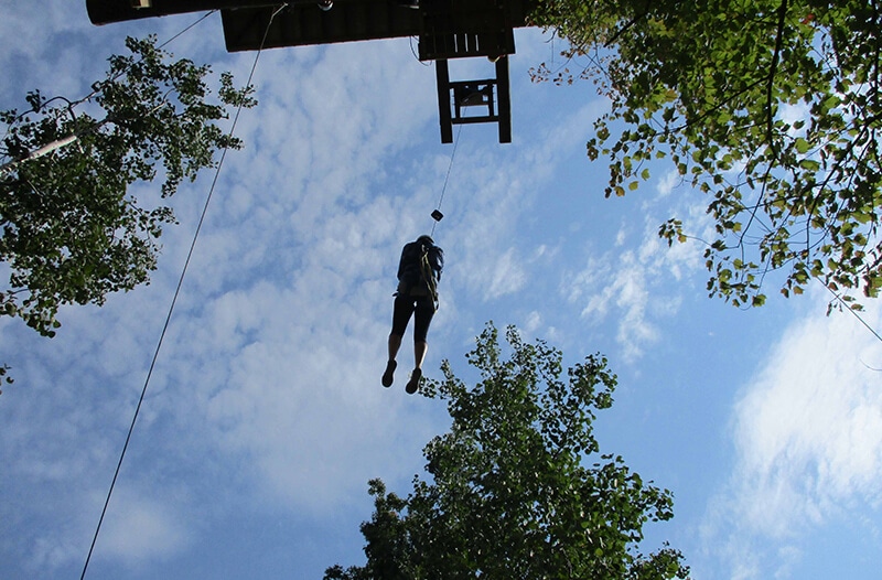 Flies through the air on zipline course